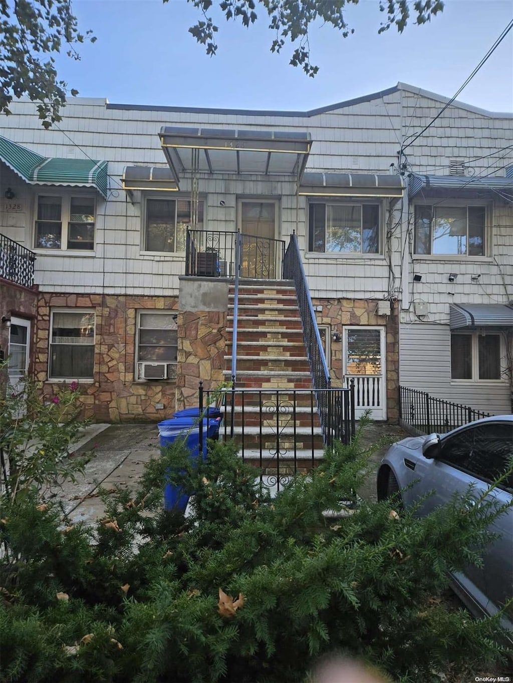 rear view of house with cooling unit