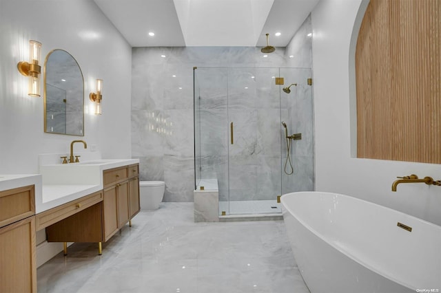 full bathroom with toilet, vanity, and shower with separate bathtub