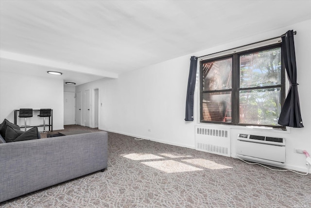 carpeted living room with radiator heating unit and an AC wall unit