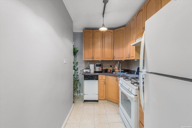 kitchen featuring backsplash, white appliances, sink, decorative light fixtures, and light tile patterned flooring