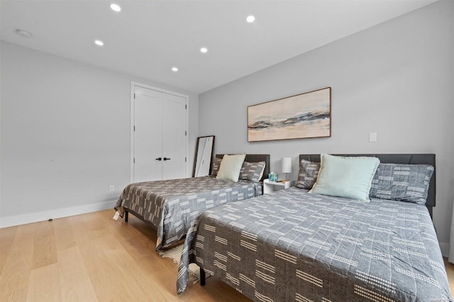 bedroom featuring light hardwood / wood-style flooring