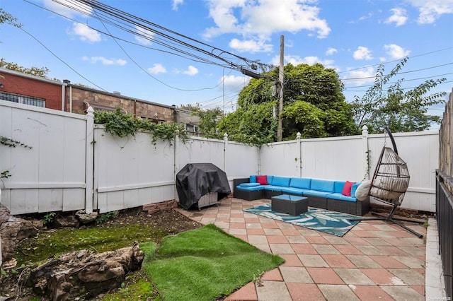 view of patio / terrace featuring an outdoor living space and grilling area