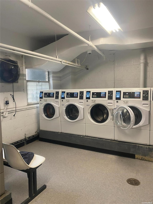 washroom featuring washing machine and dryer