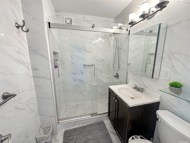 bathroom with toilet, vanity, tile walls, and walk in shower