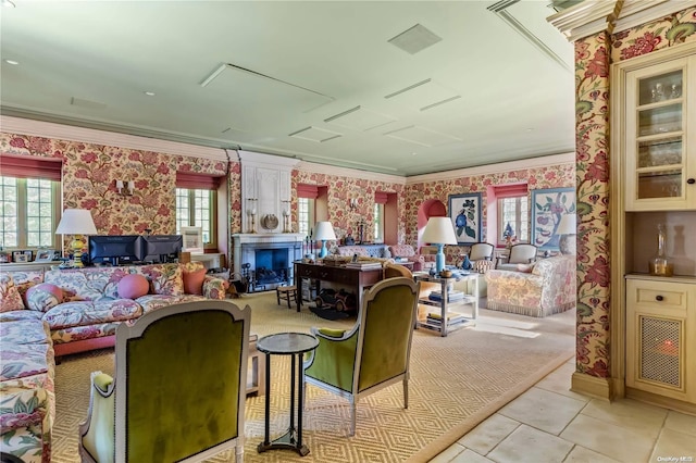 living room with ornamental molding and light tile patterned flooring