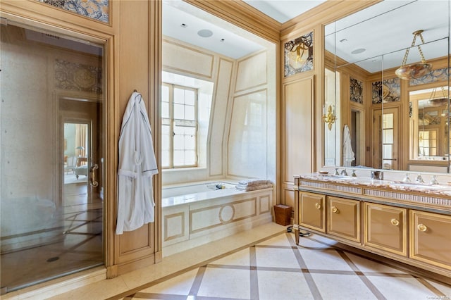 bathroom featuring vanity and a tub to relax in