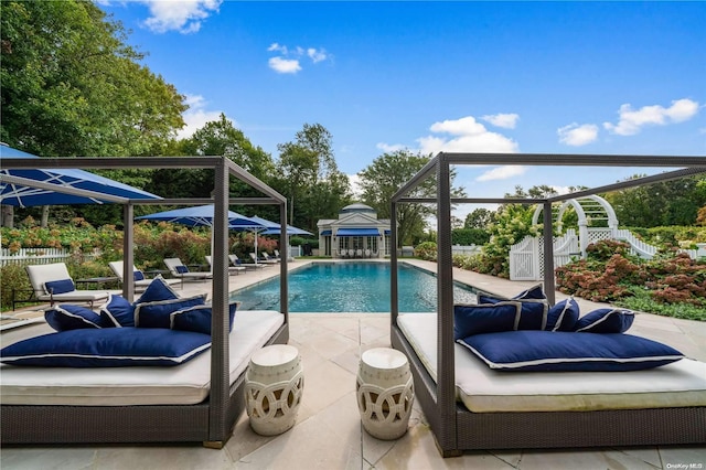 view of pool featuring a gazebo and a patio