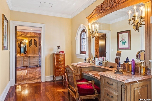 bathroom featuring hardwood / wood-style flooring, vanity, ornamental molding, and a chandelier