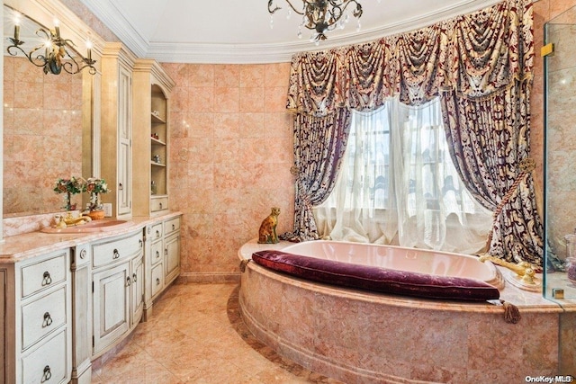 bathroom featuring a bathing tub, crown molding, and vanity