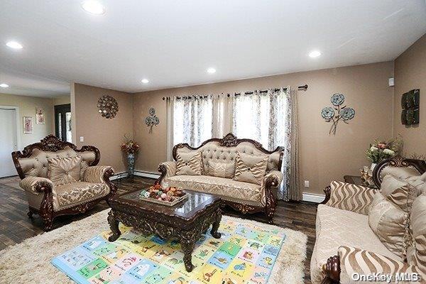 living room with dark wood-type flooring