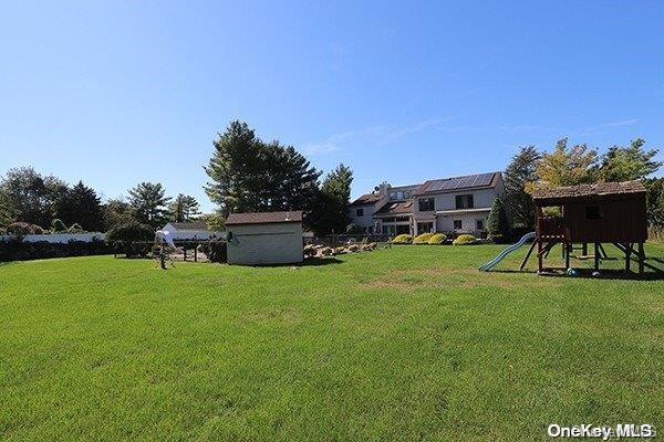 view of yard featuring a playground