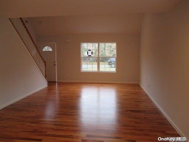 empty room featuring hardwood / wood-style floors