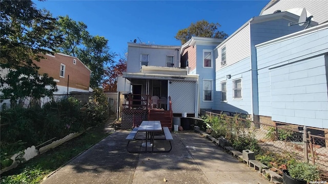 back of property featuring a patio