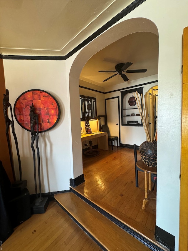 corridor featuring hardwood / wood-style floors