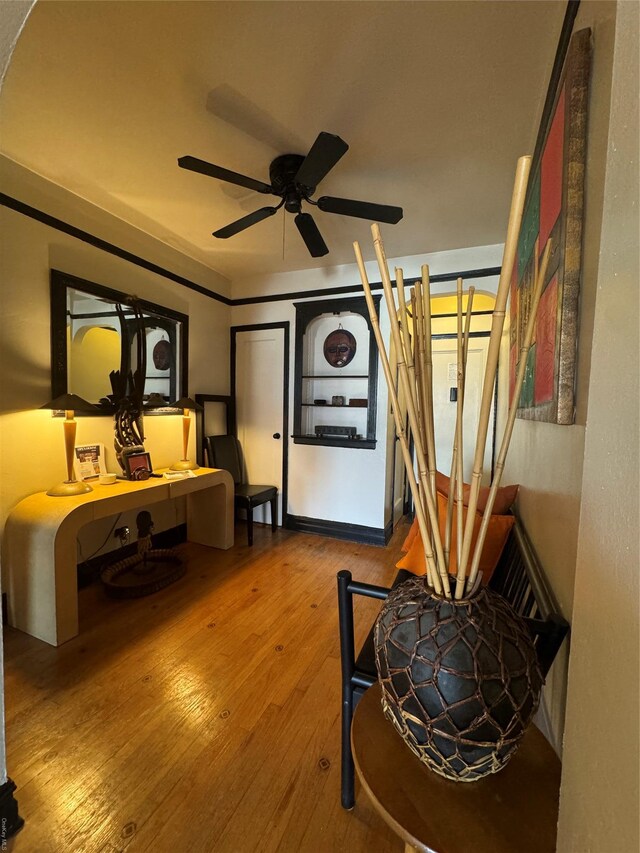 bedroom featuring hardwood / wood-style floors and ceiling fan