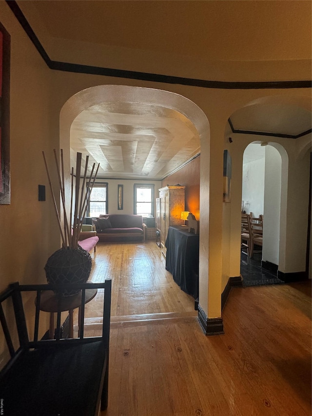 corridor featuring hardwood / wood-style floors