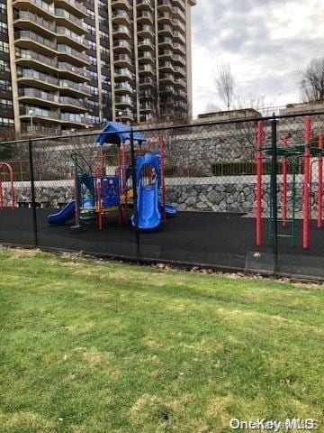 view of playground featuring a yard