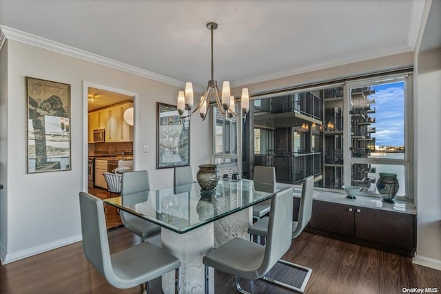 dining space with a chandelier, ornamental molding, plenty of natural light, and dark wood-type flooring