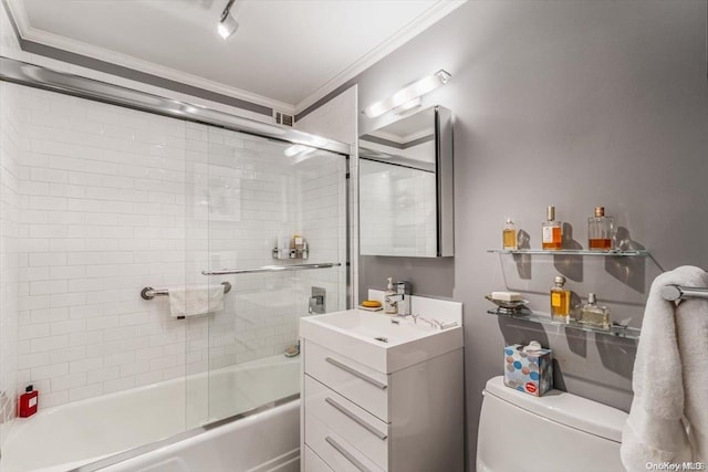 full bathroom with vanity, toilet, shower / bath combination with glass door, and crown molding