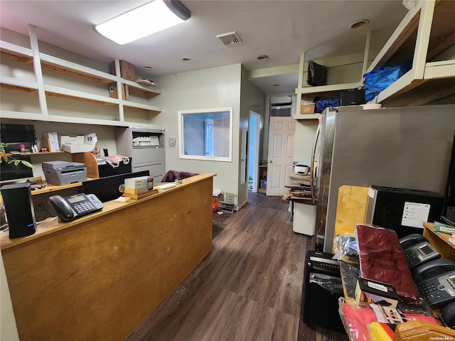 office with dark hardwood / wood-style flooring