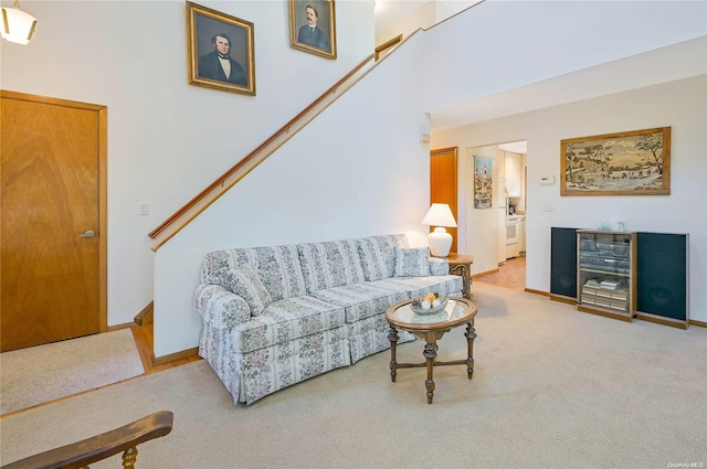 living room featuring light colored carpet