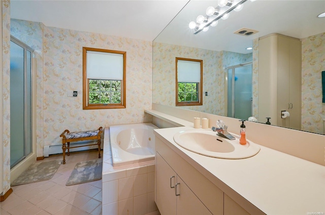 bathroom with vanity, a baseboard radiator, tile patterned floors, and a healthy amount of sunlight