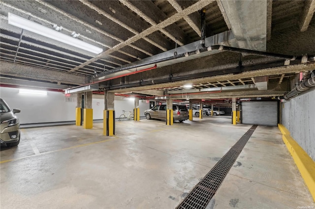 garage featuring a baseboard heating unit