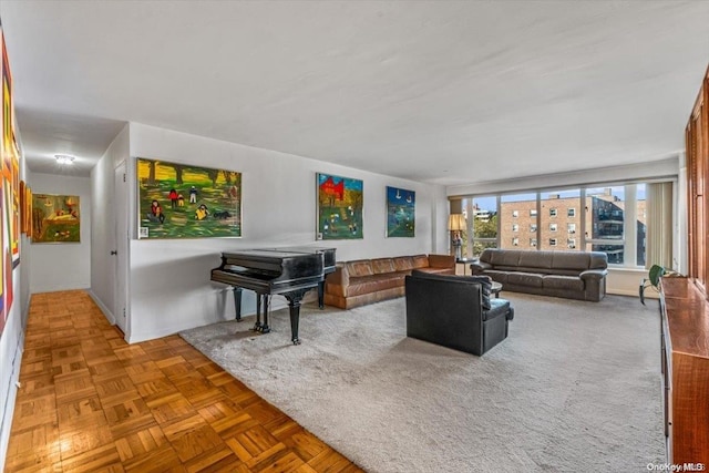 living room featuring parquet flooring