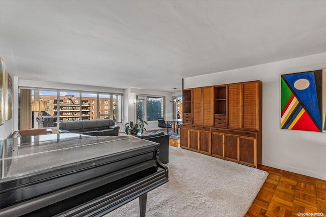 living room featuring dark parquet floors