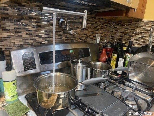 interior details featuring backsplash