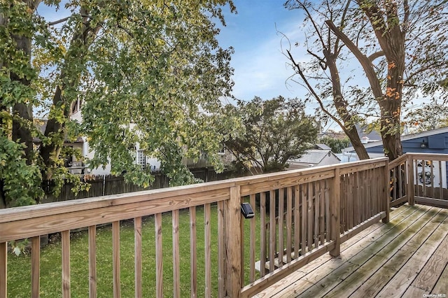 wooden deck with a yard