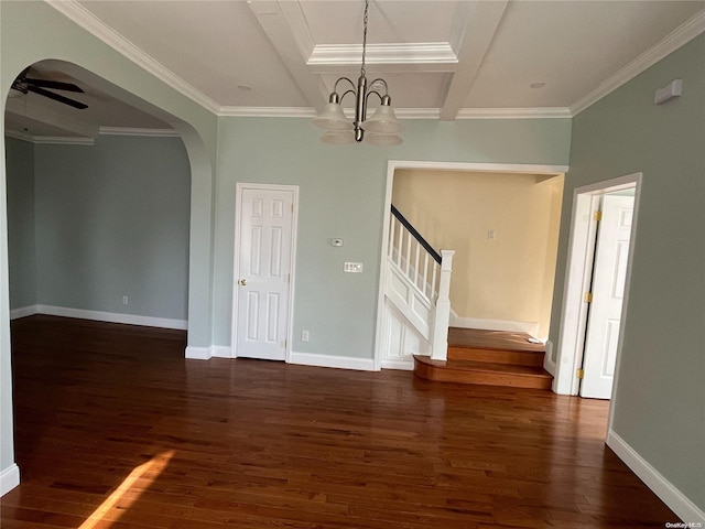 interior space with ceiling fan with notable chandelier, crown molding, and dark wood-type flooring