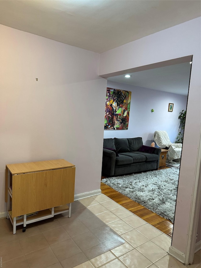 living room with light tile patterned floors