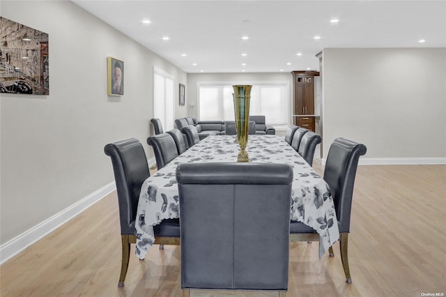 dining area with light hardwood / wood-style flooring