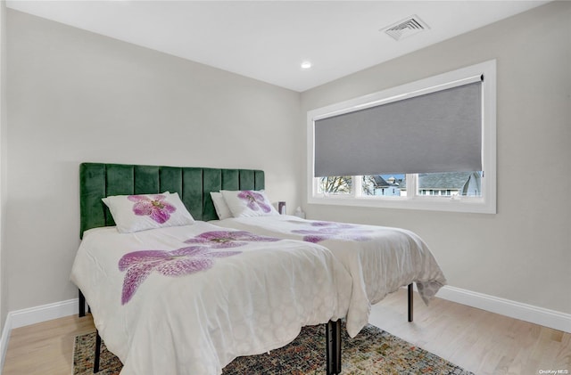 bedroom featuring light hardwood / wood-style floors