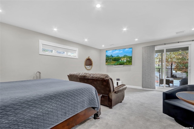 carpeted bedroom featuring access to exterior