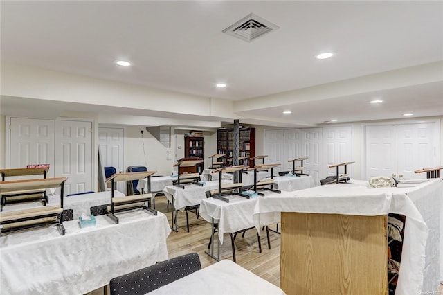 dining room featuring light hardwood / wood-style floors