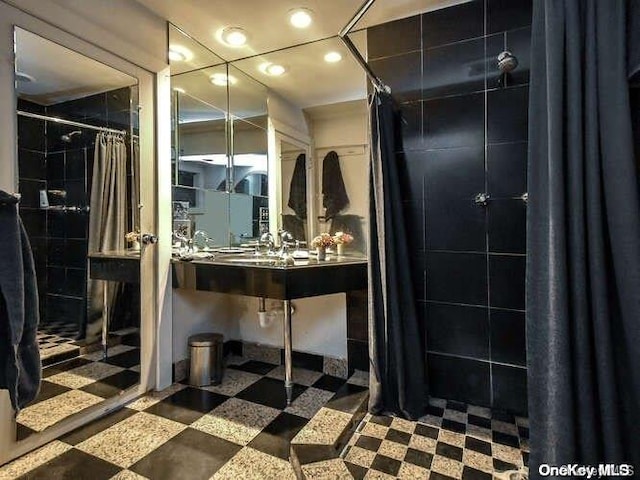 143 Piping Rock Rd, Locust Valley, NY 11560 - full bathroom with tile patterned floors, a tile shower, and recessed lighting