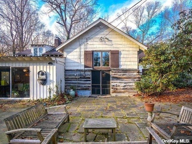 back of house featuring a patio area