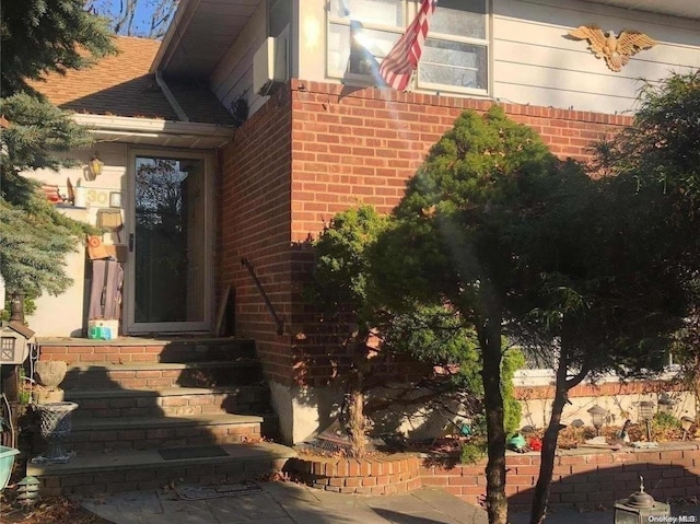 330 Ellison Ave, Westbury, NY 11590 - property entrance featuring brick siding