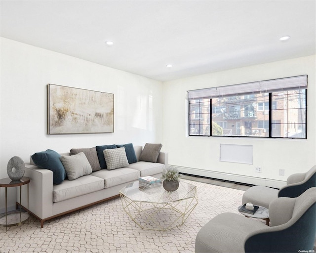 living room with light hardwood / wood-style flooring and baseboard heating