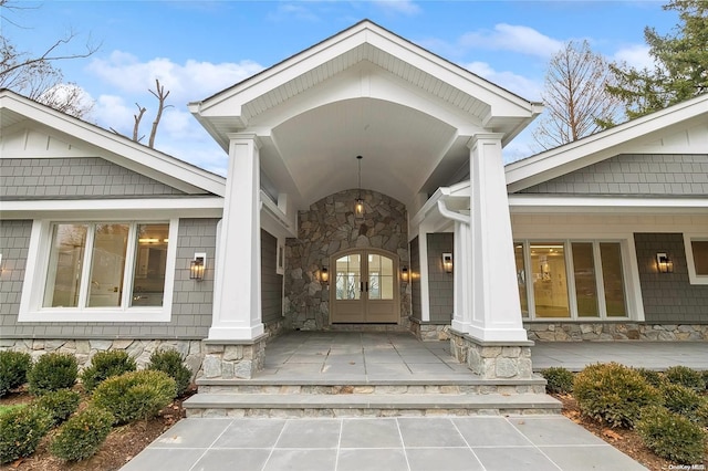 doorway to property featuring covered porch