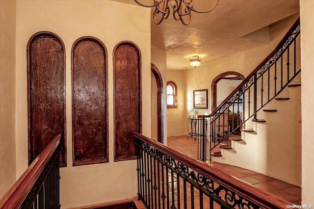 foyer featuring a textured ceiling