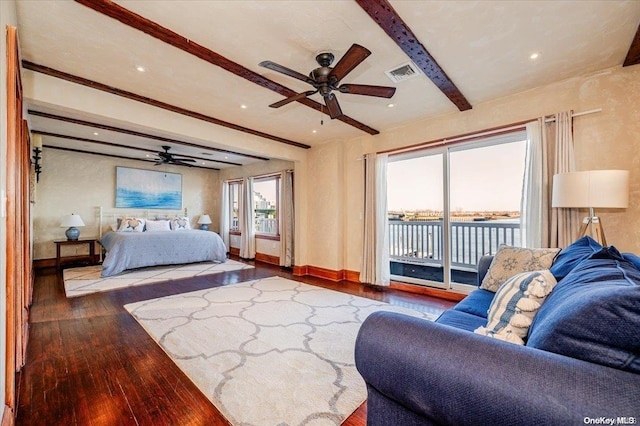 bedroom featuring hardwood / wood-style floors, access to outside, ceiling fan, ornamental molding, and beam ceiling