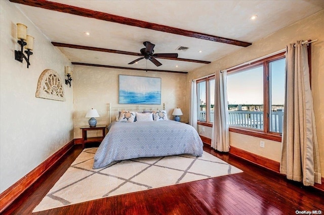 bedroom featuring ceiling fan, beam ceiling, and wood-type flooring