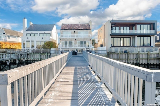 back of property with a water view