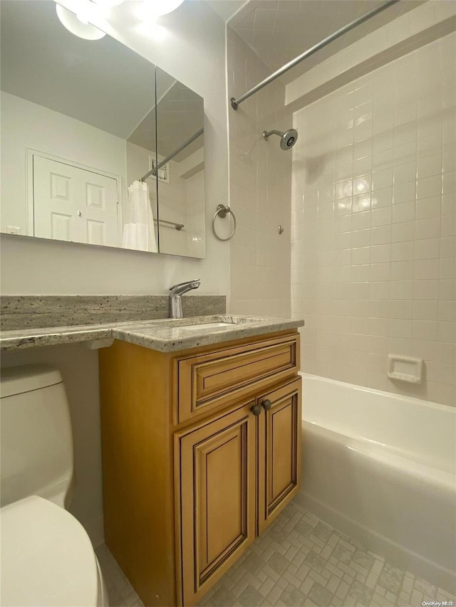 full bathroom with vanity, toilet, and shower / bath combo with shower curtain