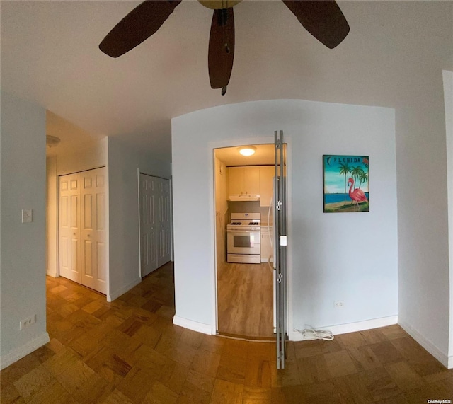 interior space featuring dark hardwood / wood-style floors and ceiling fan