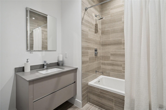 bathroom with vanity and shower / tub combo with curtain