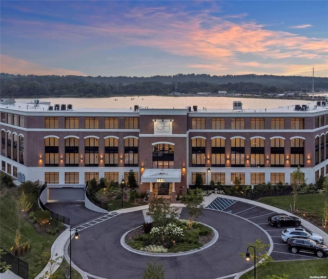 outdoor building at dusk with a water view